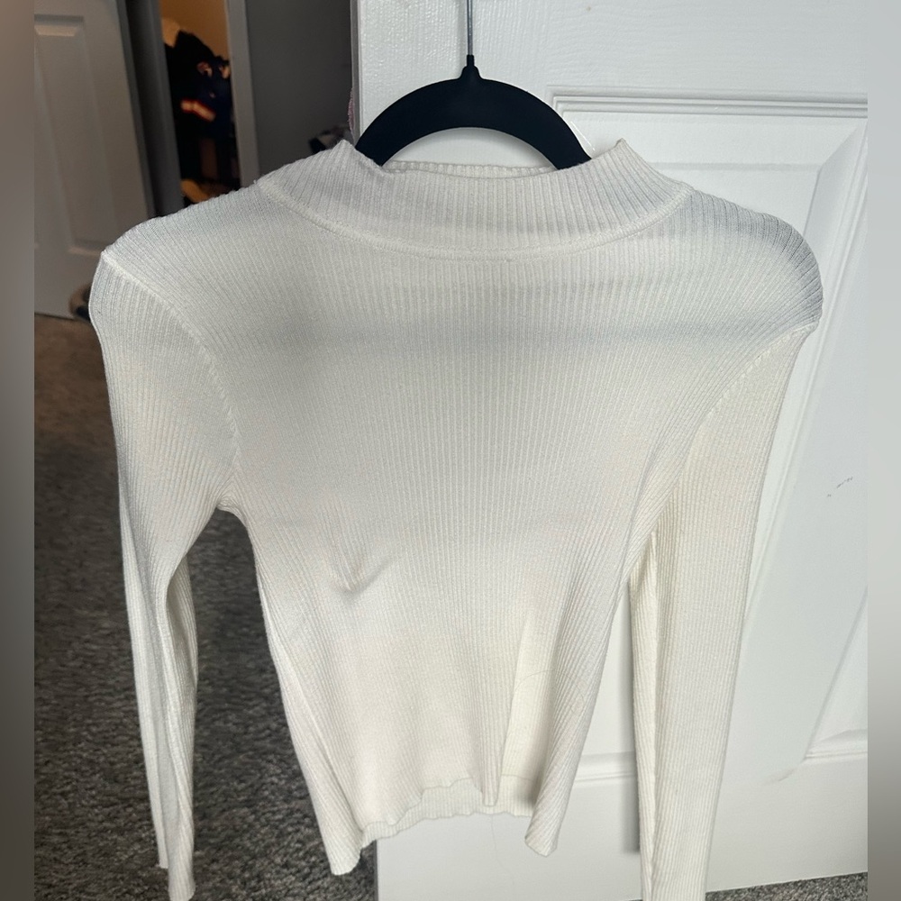 White turtleneck sweater